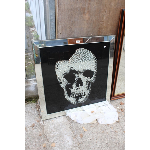 2880 - A MODERN WALL DECORATION DEPICTING A MIRRORED SKULL, 35.5