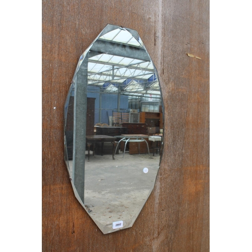 2882 - A MID 20TH CENTURY FRAMELESS WALL MIRROR 27