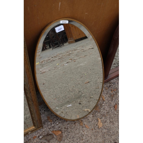 2891 - A MODERN OVAL METAL FRAMED BEVEL EDGE WALL MIRROR, 27