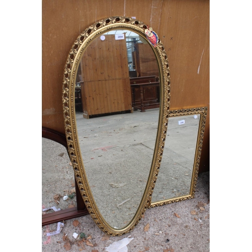 2894 - A MODERN GILT FRAMED PERRY OVERMAN (GLOVE) WALL MIRROR, 48