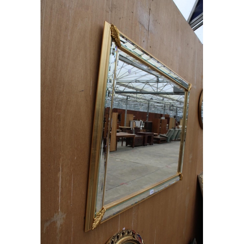 2895 - A MODERN GILT FRAMED AND BEVEL EDGE WALL MIRROR, 40