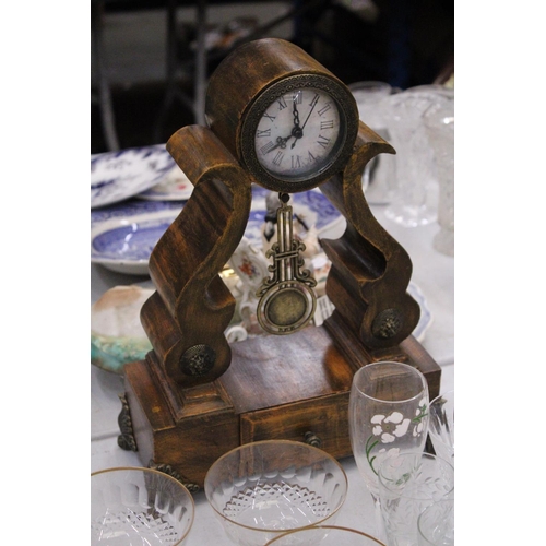 295 - A BATTERY OPERATED WOODEN MANTEL CLOCK WITH DRAW - APPROXAMTLEY 38CM