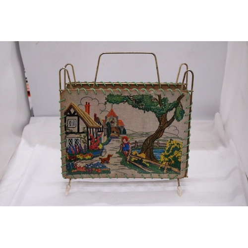 300 - A VINTAGE MAGAZINE RACK - APPROXIMATELY 35CM HIGH