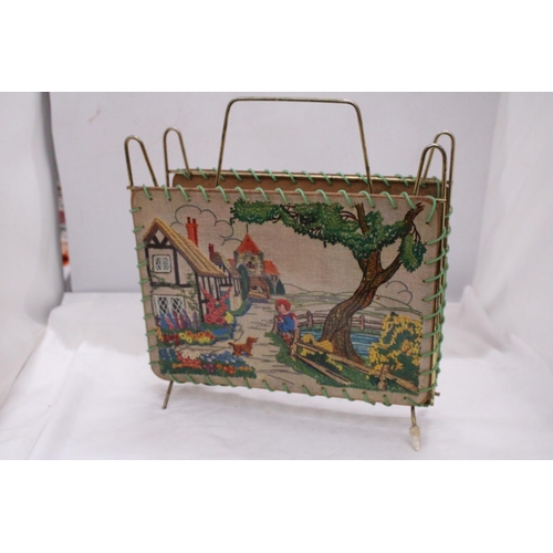 300 - A VINTAGE MAGAZINE RACK - APPROXIMATELY 35CM HIGH