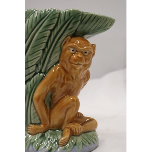 230A - A MAJOLICA STYLE MONKEY VASE