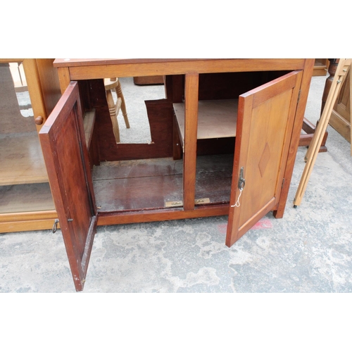 2913 - A TEAK TWO DOOR CABINET