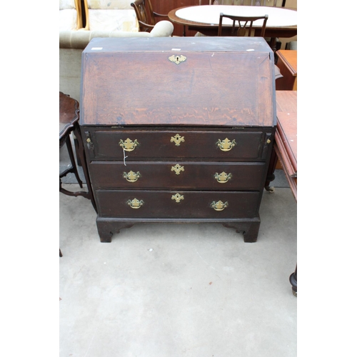 2930 - A GEORGE IV OAK BUREAU WITH FITTED INTERIORS, THREE GRADUATED DRAWERS AND BRACKET FEET, 34.5