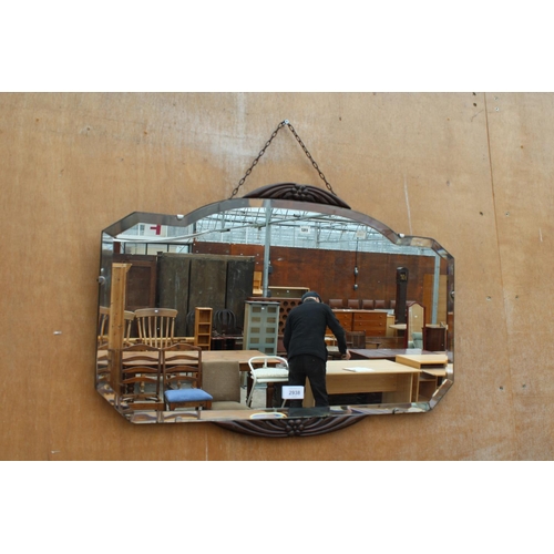 2938 - A MID CENTURY FRAMELESS WALL MIRROR WITH OAK FOLIATE DECORATION