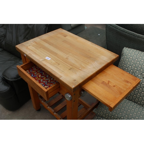 2921 - A MODERN KITCHEN WORK TABLE ON CASTERS WITH WOODBLOCK TOP WITH SINGLE DRAWER AND PULL-OUT SLIDE, 26