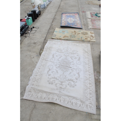 2497 - THREE VARIOUS SIZED PINK PATTERNED RUGS