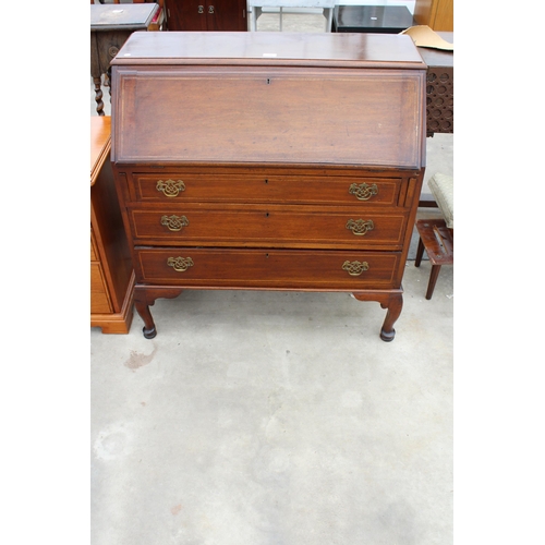 2942 - AN EDWARDIAN MAHOGANY AND INLAID BUREAU ON CABRIOLE LEGS, 36 INCHES WIDE