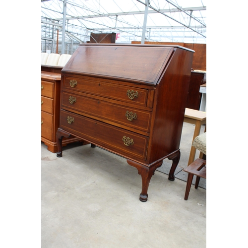 2942 - AN EDWARDIAN MAHOGANY AND INLAID BUREAU ON CABRIOLE LEGS, 36 INCHES WIDE