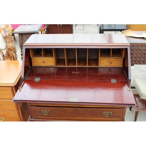 2942 - AN EDWARDIAN MAHOGANY AND INLAID BUREAU ON CABRIOLE LEGS, 36 INCHES WIDE