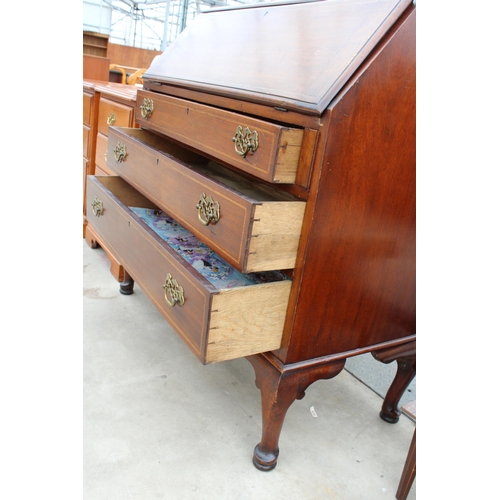 2942 - AN EDWARDIAN MAHOGANY AND INLAID BUREAU ON CABRIOLE LEGS, 36 INCHES WIDE