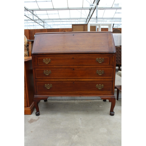 2942 - AN EDWARDIAN MAHOGANY AND INLAID BUREAU ON CABRIOLE LEGS, 36 INCHES WIDE