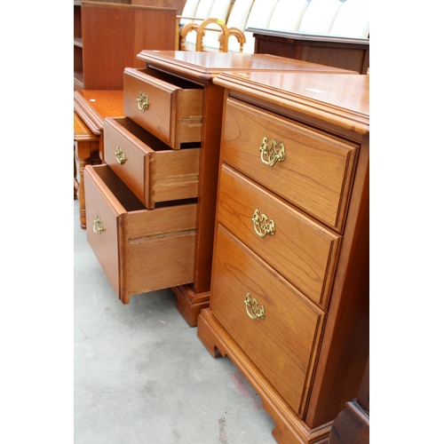 2943 - A PAIR OF YOUNGER FURNITURE BEDSIDE CHESTS OF 3 DRAWERS ON BRACKET FEET