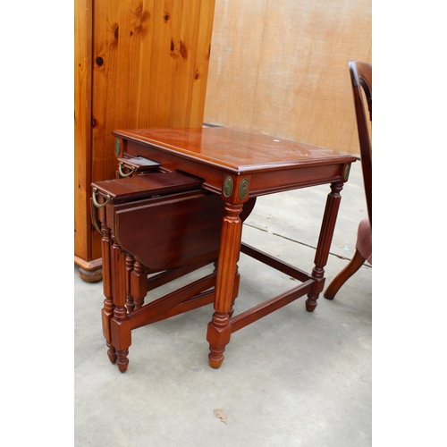 2955 - A MODERN MAHOGANY AND CROSS BANDED NEST OF THREE TABLES AND VICTORIAN MAHOGANY LOW CHAIR