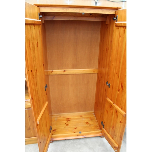 2956 - A MODERN PINE TWO DOOR WARDROBE, 33