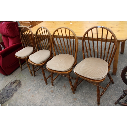 2902 - A SET OF FOUR BEECH FRAMED WINDSOR STYLE SPINDLE BACK DINING CHAIRS