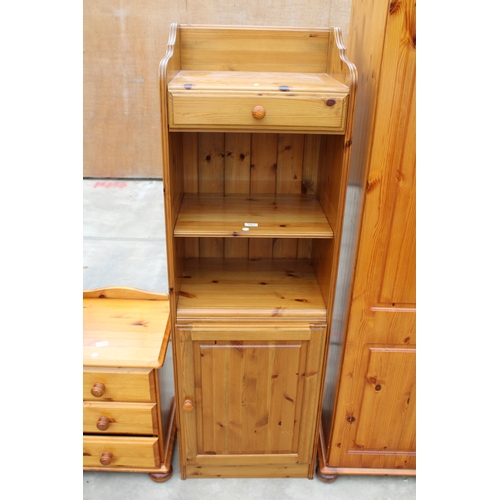 2957 - A MODERN DUCAL PINE OPEN STORAGE UNIT WITH CUPBOARD AND DRAWER, 19.5