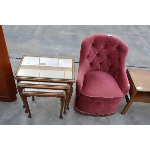 2963 - TWO ITEMS TO INCLUDE A PINK BEDROOM CHAIR AND A NEST OF THREE MAHOGANY TABLES WITH INSERT GLASS TOPS