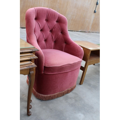 2963 - TWO ITEMS TO INCLUDE A PINK BEDROOM CHAIR AND A NEST OF THREE MAHOGANY TABLES WITH INSERT GLASS TOPS