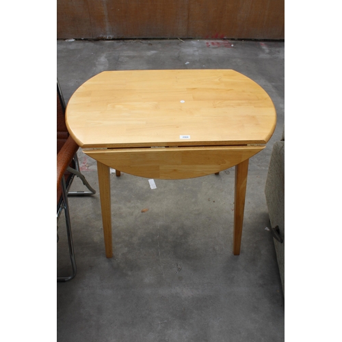 2968 - AN OAK DROP LEAF TABLE, DIAMETER 92CM