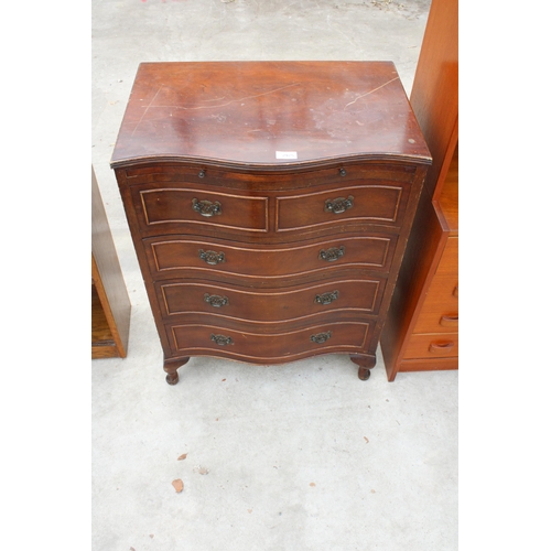 2975 - A REPRODUCTION MAHOGANY SERPENTINE CHEST OF DRAWERS WITH PULL OUT WRITING SLIDE AND FOUR LONG DRAWER... 