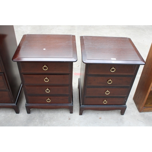 2977 - A PAIR OF STAG MINSTREL FOUR DRAWER BEDSIDE CHESTS