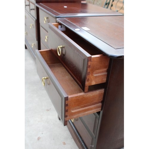 2977 - A PAIR OF STAG MINSTREL FOUR DRAWER BEDSIDE CHESTS