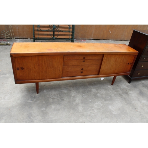 2979 - A BRAMIN OF DENMARK, MID CENTURY DANISH TEAK SIDEBOARD ENCLOSING TWO CUPBOARDS AND FOUR LONG DRAWERS...
