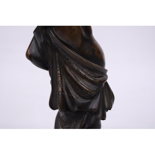 301 - A BRONZE MEIJI PERIOD STATUE OF A FIGURE HOLDING A VASE WITH COVER