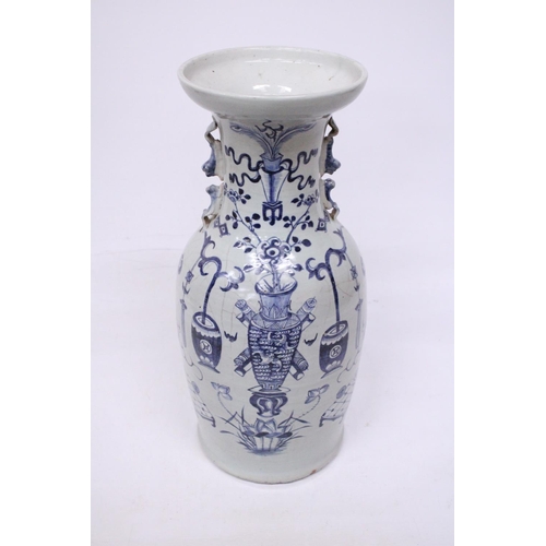 303 - A CHINESE BALUSTER SHAPED CELADON GLAZED VASE - 44.5 CM (H)