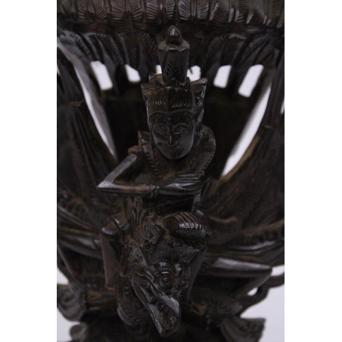 322 - A WOOD CARVING OF GARUDA WITH THE GOD VISHNU - 29 CM (H)