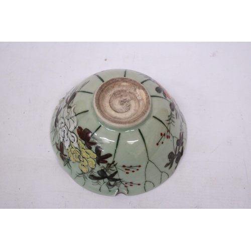 331 - A CHINESE PORCELAIN GLAZED FOOTED BOWL WITH FLORAL DECORATION