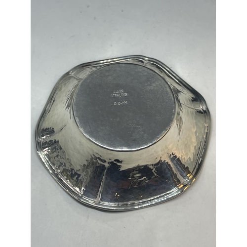 100 - A STERLING SILVER CIRCULAR DISH