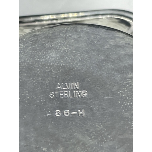 100 - A STERLING SILVER CIRCULAR DISH