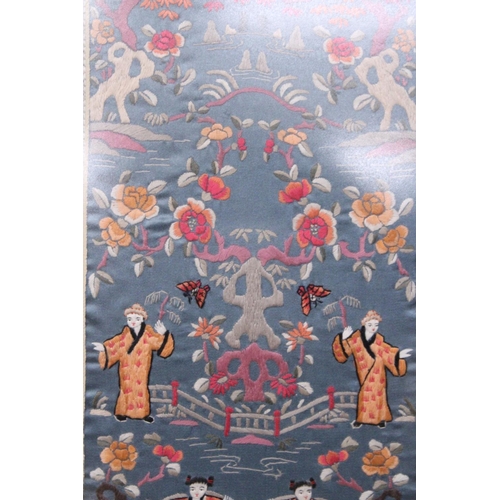 338 - THREE CHINESE SILK EMBROIDERIES DEPICTING A LANDSCAPE SCENE, BIRDS AND FLORALS IN BAMBOO FRAMES