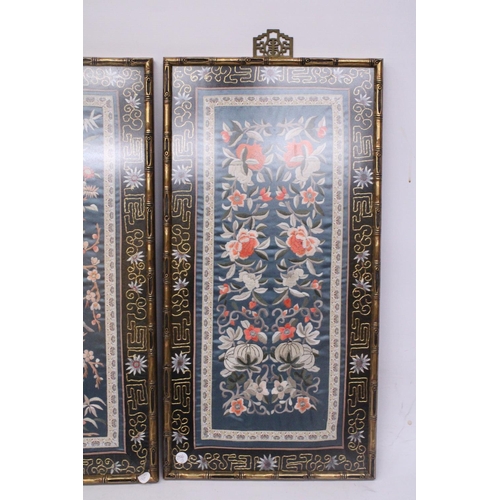 338 - THREE CHINESE SILK EMBROIDERIES DEPICTING A LANDSCAPE SCENE, BIRDS AND FLORALS IN BAMBOO FRAMES