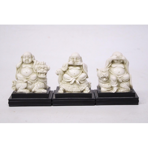 356 - A SET OF BUDDAH FIGURES ON WOODEN PLINTHS - SEE, HEAR AND SPEAK NO EVIL