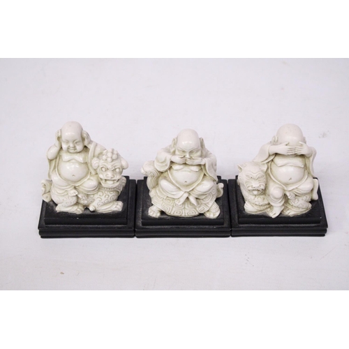 356 - A SET OF BUDDAH FIGURES ON WOODEN PLINTHS - SEE, HEAR AND SPEAK NO EVIL