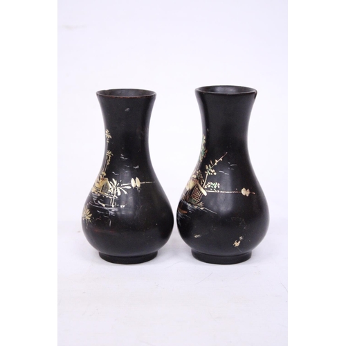 362 - A PAIR OF FOOTED WOODEN LACQUER VASES WITH ORIENTAL SCENES - 14 CM (H)