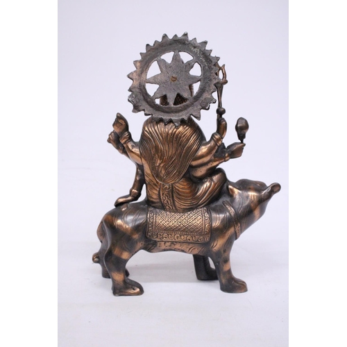 369 - A BRONZE EXOTIC INDIAN MOTHER GODDESS ON A TIGER'S BACK, HEIGHT 38CM, LENGTH 28CM