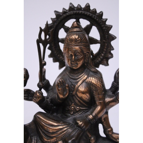 369 - A BRONZE EXOTIC INDIAN MOTHER GODDESS ON A TIGER'S BACK, HEIGHT 38CM, LENGTH 28CM