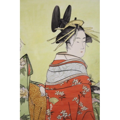 372 - A JAPANESE WATERCOLOUR OF TWO GEISHA GIRLS FRAMED AND GLAZED - 75 CM X 50 CM