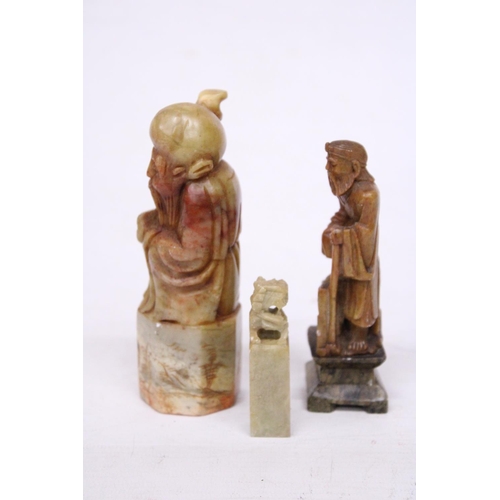 382 - A CHINESE SHOU LAO TAO IMMORTAL CARVED SOAPSTONE SEAL TOGETHER WITH TWO FURTHER CARVINGS