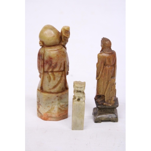 382 - A CHINESE SHOU LAO TAO IMMORTAL CARVED SOAPSTONE SEAL TOGETHER WITH TWO FURTHER CARVINGS