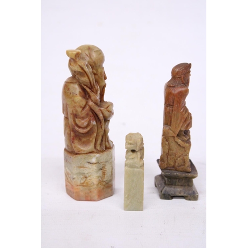 382 - A CHINESE SHOU LAO TAO IMMORTAL CARVED SOAPSTONE SEAL TOGETHER WITH TWO FURTHER CARVINGS