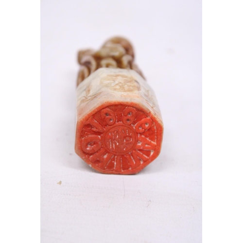 382 - A CHINESE SHOU LAO TAO IMMORTAL CARVED SOAPSTONE SEAL TOGETHER WITH TWO FURTHER CARVINGS