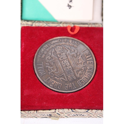 389 - A BOXED BRONZE MEDAL 